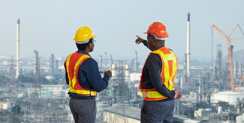 engineers overseeing an industry site 