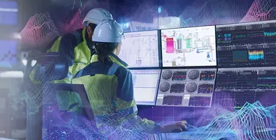 Woman_and_man_in_hard_hats_looking_at analytics_screen