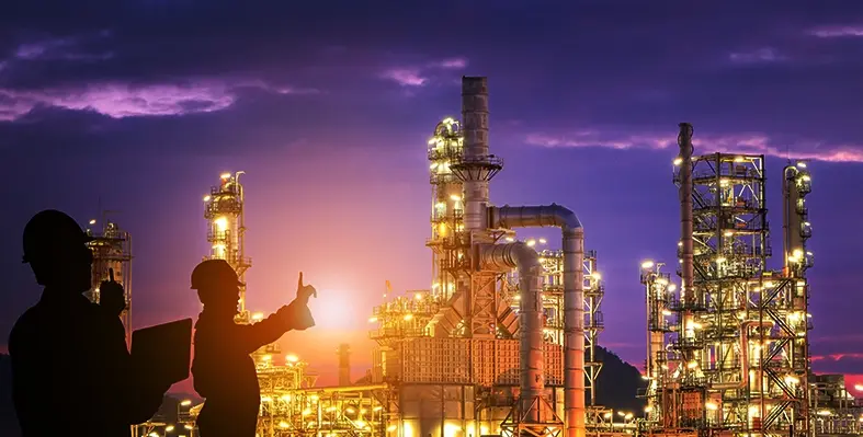 workers in oil and gas plant